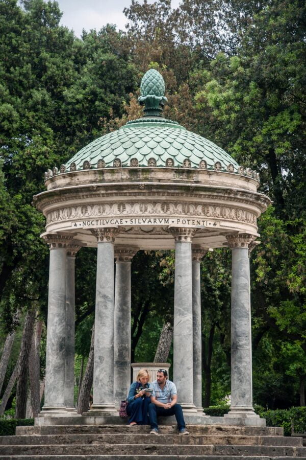 Old monument with columns and trees